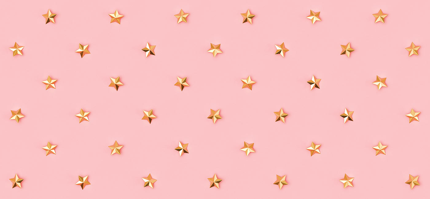 Gold star pattern on pink background