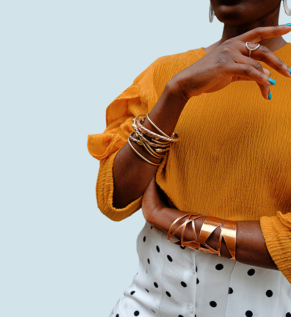 Revolve brand photo of woman in yellow top with polka dot pants