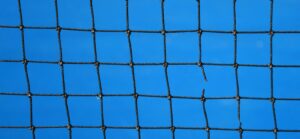 Tennis net with one broken piece